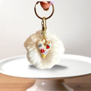 🎅🏻 SALE! White Fuzzy ball with heart charm bag charm Or key chain brand new